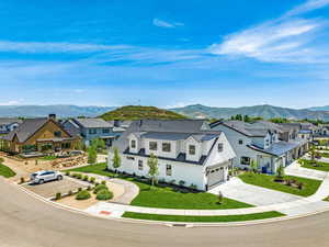 Birds eye view of property featuring a residential view and a mountain view