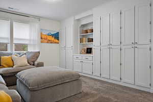 Carpeted bedroom with visible vents