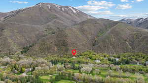 View of mountain feature featuring view of golf course