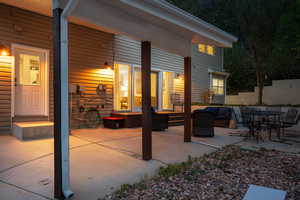 View of patio featuring outdoor lounge area and entry steps