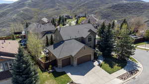 Birds eye view of property featuring a residential view and a mountain view