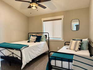 Bedroom with carpet floors and ceiling fan
