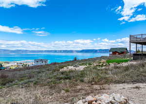 View of water feature with a mountain view