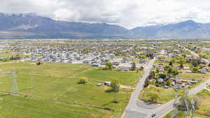 Drone / aerial view with a mountain view and a residential view