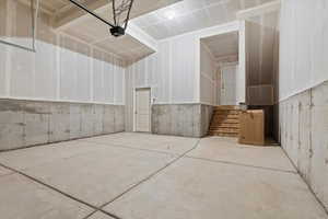 Garage featuring a garage door opener