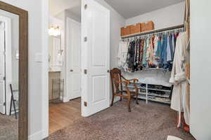 Walk in closet featuring tiled floors