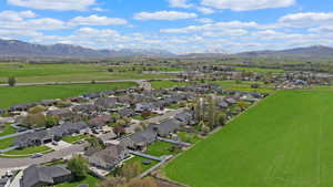 Drone / aerial view featuring a mountain view and a residential view