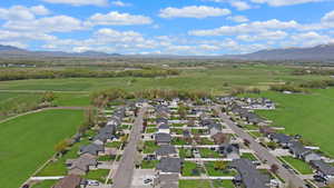Aerial view with a residential view, a mountain view, and a rural view