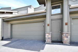 Garage featuring driveway