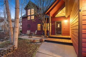 Entrance to property featuring a patio
