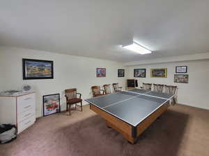 Playroom featuring a pool/table tennis that stays with the home