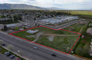 Birds eye view of property with a mountain view