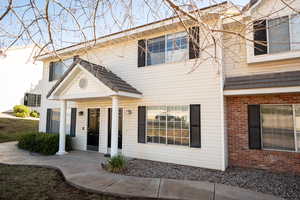 View of front of home with brick siding