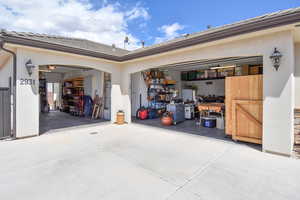 Garage featuring driveway