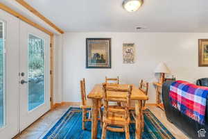 Dining room with baseboards and visible vents