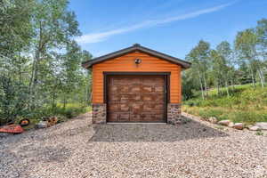 Garage featuring driveway