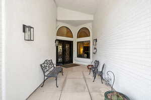 Doorway to property featuring french doors
