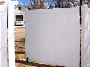 Large Double Gate to get all your toys into the backyard... or maybe a Camper Trailer that can act as a spare bedroom for your out of town guests??