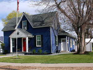 2nd view of front yard. Red door is 1-bed unit - White door is 3 bed unit.