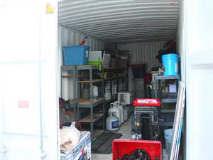 Interior view of the painted shipping container along the west side of the property.  The container is 20 feet long and 8 feet wide.  Plenty of storage!
