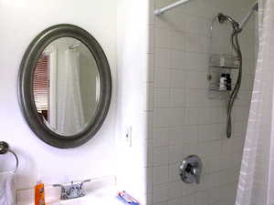 3/4 bathroom featuring vanity, toilet and shower stall in the 1-bed Red Door unit.  Unit comes with everything you see in the photo.