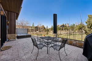 View of patio featuring outdoor dining area