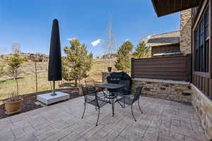 View of patio featuring outdoor dining area