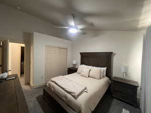 Bedroom with carpet floors, baseboards, a ceiling fan, and a closet