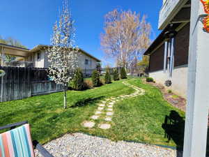 View of yard with fence