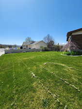 View of yard with fence