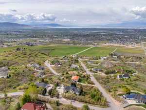 Drone / aerial view featuring a mountain view and a residential view