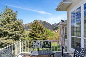 Balcony featuring a mountain view