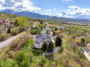 Drone / aerial view with a mountain view and a residential view