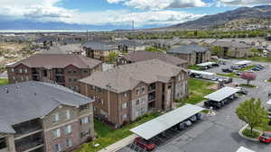 Aerial view featuring a residential view and a mountain view