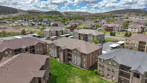Birds eye view of property featuring a residential view and a mountain view