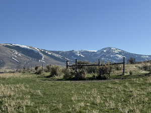 Property view of mountains featuring a rural view
