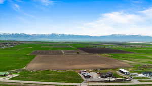 Drone / aerial view with a mountain view and a rural view
