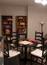 Dining area with carpet flooring