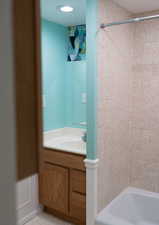 Full bathroom with vanity