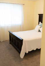 Bedroom featuring carpet flooring