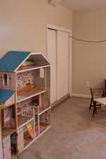 Interior space with baseboards and a closet