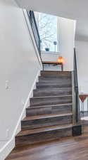 Staircase with wood finished floors