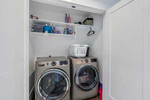 Clothes washing area with laundry area and washing machine and clothes dryer
