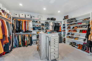 Spacious Master closet featuring carpet