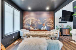 featuring recessed lighting, wood finished floors,