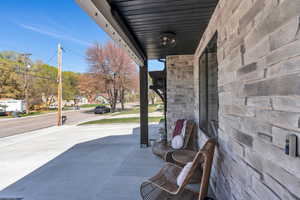 View of patio featuring covered porch