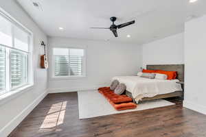 Bedroom with recessed lighting, and wood finished floors