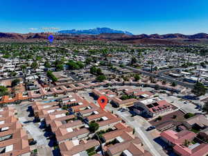 Drone / aerial view with a residential view and a mountain view