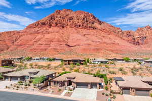 Property view of mountains with a residential view