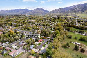 Drone / aerial view featuring a mountain view and a residential view
